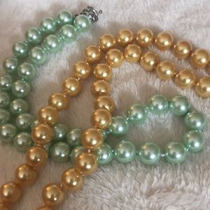 Pair of Gold and Green 12mm Pearl necklace